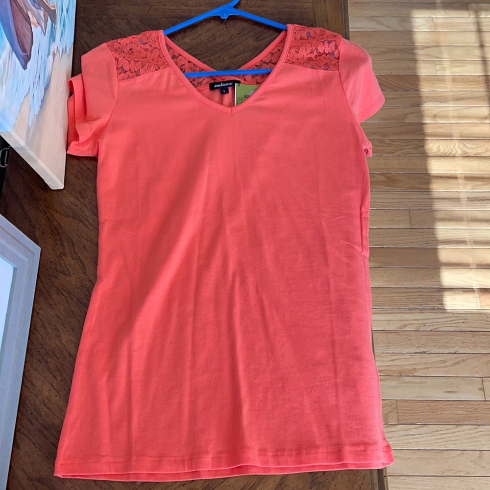 Cutest orange top with the prettiest lace!